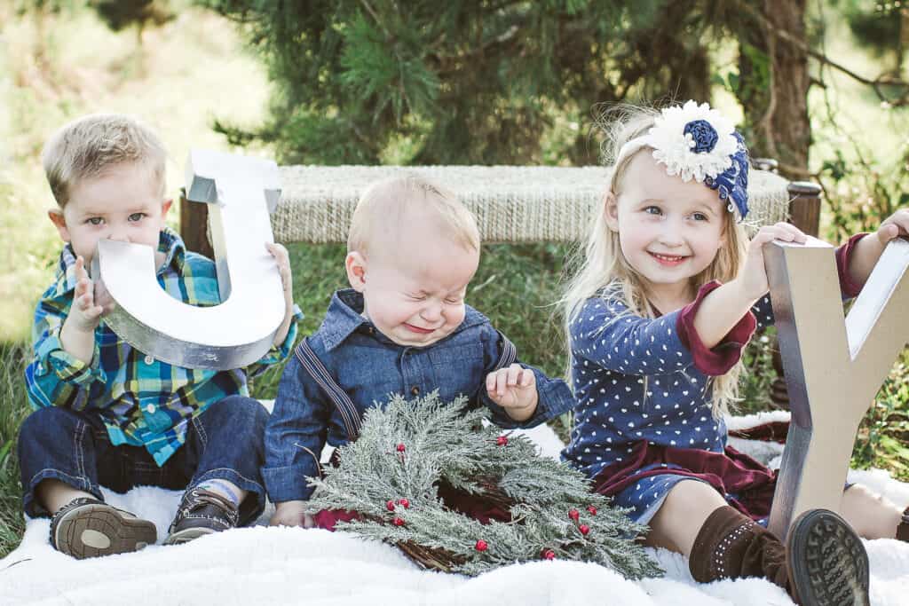 Crying babies make cute family photos.