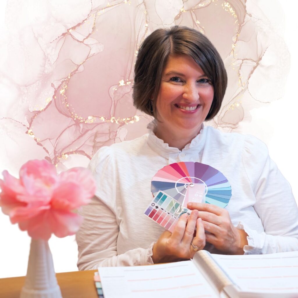 woman holding summer color analysis fan with pink flowers and pink background